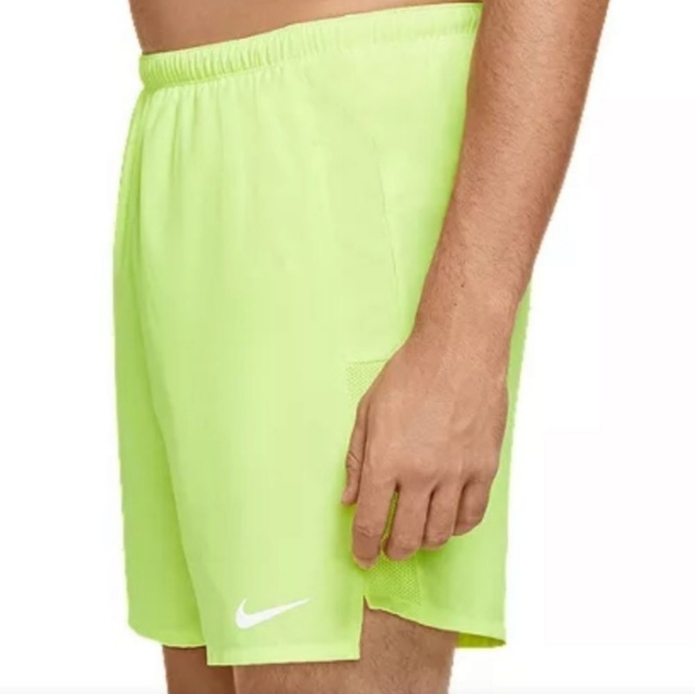 green nike shorts